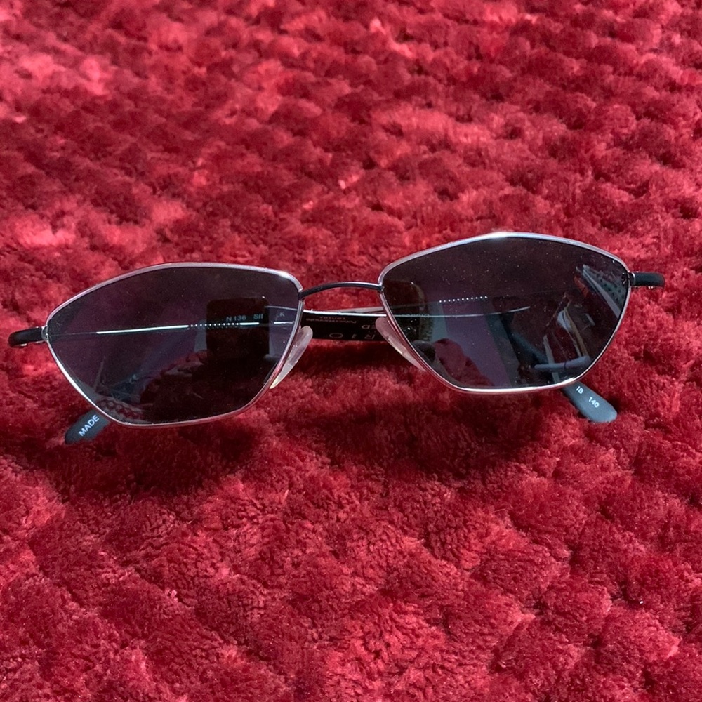 Notorio Occhiali N136 sunwear asymmetrical shaped silver rim polarized lens